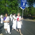 Junior Michael Sloman proudly carries Pace's standard