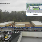 The temporary building on the torn-up lower field.