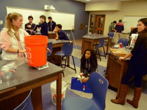 Sophomores Keely Harris, Tahirih Williams and Sophie Zelony aim their water spout in Mr. Hattori's Hydraulics class.