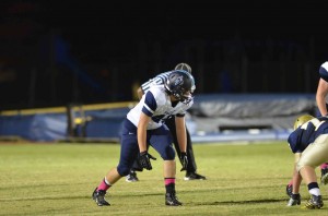 Sophomore linebacker Kyle Orr gets ready to rush the quarterback in the 17-14 loss to Landmark Christian Academy. Photo: Fred Assaf