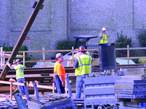 Construction workers will be hard at work until the Arthur M. Blank Upper School is complete. Photo: Fred Assaf