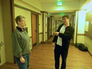 Ms. Stevens and Mr. Tannenblatt avidly discuss the pros and cons of medieval weaponry. Credit: Sean Murtaugh