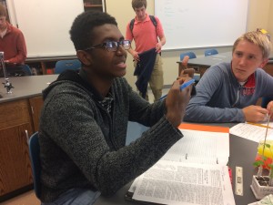 Senior Kamran Sadiq discusses concepts in AP Biology, trying to stay on top of the massive workload.