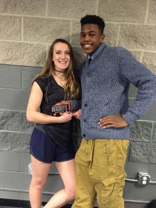 Seniors Natasha Holifield enjoys her Hershey's Bar given to senior boyfriend Elijah Holifield.
