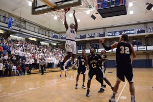 Sophomore Wendell Carter Jr. flies in for a dunk in the first round of the state playoffs against the Temple Tigers. Photo: Fred Assaf