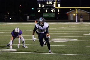 Junior wide receiver Trey Blount III takes off down the sideline on his first touchdown catch of the night. Photo: Fred Assaf