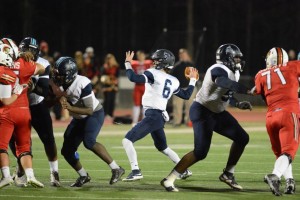 QB Gunnor Faulk fires the ball deep in the first half.