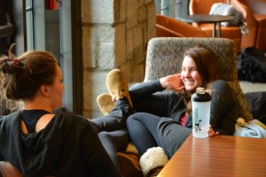 Seniors Darby Cochran and Grace Ferry enjoy themselves in lieu of schoolwork in the Seaman Family Commons. Photo: Zack Kaminsky