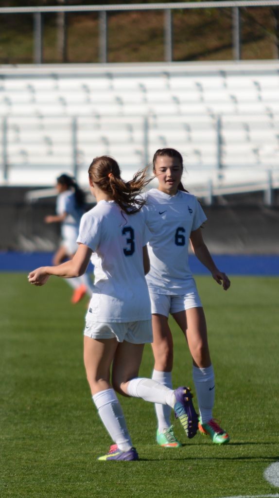 Seniors Cadie Schiffer and Cater Carlton celebrate another goal. Credit: Fred Assaf