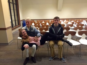 Senior Frances Crisler casually lays across two of her men: senior Mitch Inman and junior Avery Herman.