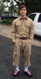 Charlie Stonecipher is punished by wearing a Goodwill outfit. Photo Credit: George Shepherd