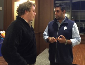 Faraz advises participant Ben Siegel on some marketing tips for his product. Photo: Sloan Wyatt