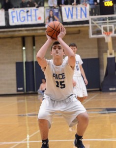 Sophomore Sebastian Bradley shoot a free-throw in the later stages of the game against rival Holy Innocents'. Photo: Fred Assaf