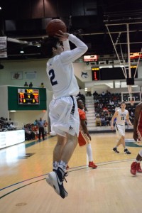 Junior Barrett Baker lines up a jump shot in the third quarter of an Elite Eight matchup against Thomasville. Baker, a junior, finished with 17 points on the night. Photo: Fred Assaf