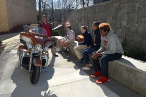 Mr. Sokolsky teaches students about his motorcycle. Photo: Caitlin Jones