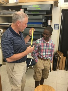 Mr. Dorman instructs freshman Tyler Henderson on the rules of photograpgy Credit: Brian Sloan