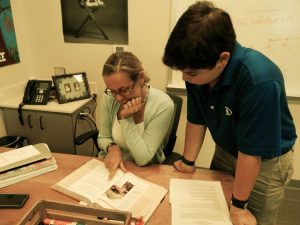 Mrs. Wilhemsen helps her ninth grade math students get through their first year of high school. Photo: Genna Schwarz
