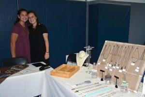 Seniors Katy Leitz and Molly Jacoby sold jewelry at the 2015 Fall Fair. Photo: Yearbook