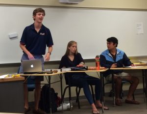 Student body president Chris Howard (standing) leads the weekly Student Council meeting, held every Wednesday. Photo: Amy Butler