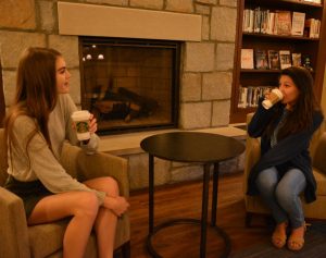 Juniors Grace Dwyer and Nicole Ortiz enjoy Starbucks drinks and each others' company.