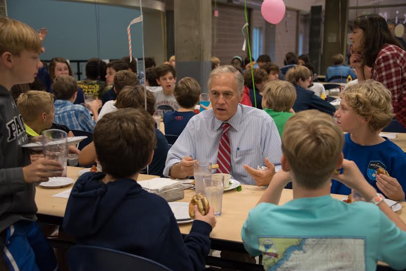 Mr. Anderson joins middle school students at lunch. Photo: Laura Inman