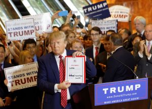 President-elect Donald Trump campaigns to voters and signs Republican loyalty pledge. Photo: Michael Vadon