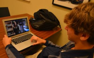 Sophmore Lawson Stricker watches his favrite show, "Criminal Minds," on Netflix. Photo: Eden Kerker