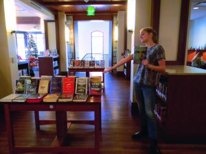 Junior Ambassador Khaki Loughran shows off the Upper School's recently renovated Woodruff library. Photo: Abby Meyerowitz